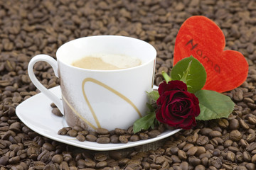 cup of coffee, red roses and heart