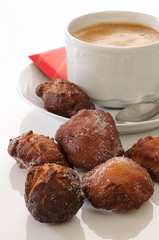 traditional spanish fritters and a white coffee