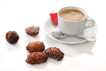 traditional spanish fritters and a white coffee