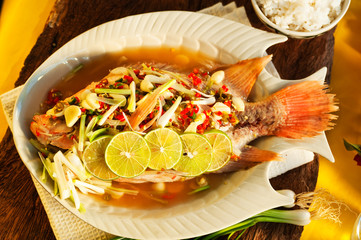 Thai food - Red snapper with garlic, chili, lemon grass and lemo