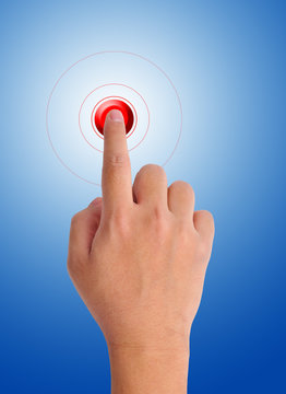 hand pushing a red button