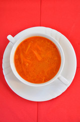 A delicious tomato soup on a red napkin
