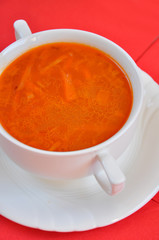 A delicious tomato soup on a red napkin