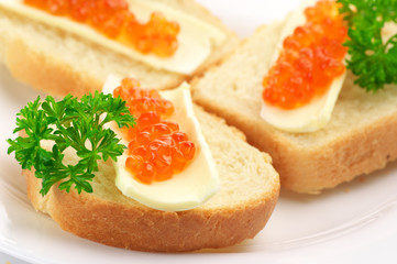 Canapes with salmon caviar