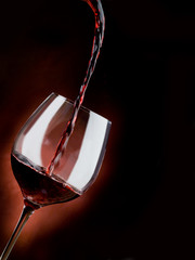 Fototapeta na wymiar glass of red wine