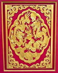 Double golden dragon in chinese style On red wood