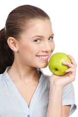 Young beauty woman with green apple