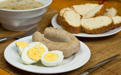 Eggs and white sausages for Easter breakfast