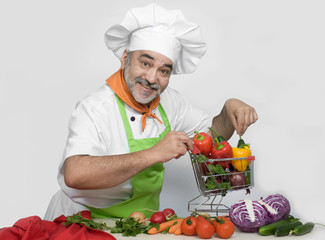 smiling chef with shopping car