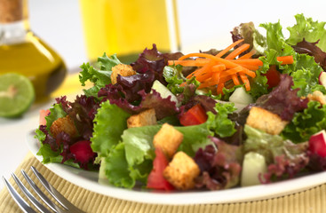 Fresh lettuce salad with croutons