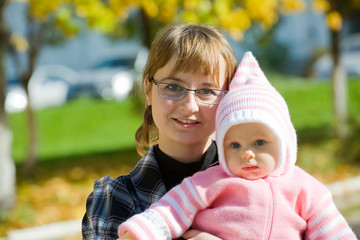 Happy mother with her baby