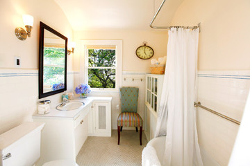 Fototapeta na wymiar Antique bathroom with white curtain and fresh view