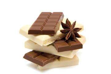 slices of black and white chocolate with anise