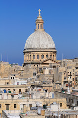 Fototapeta na wymiar Church domed skyline view in Valletta, Malta
