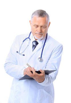 Smiling medical doctor with stethoscope. Isolated over