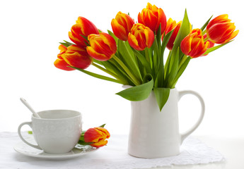 Fototapeta na wymiar red tulips and tea