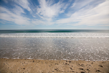 Serene sandy beach on a bright summer day