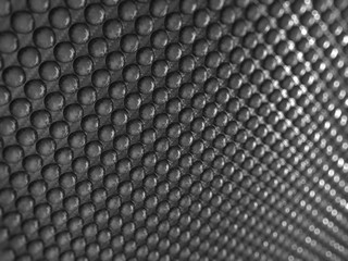 Pimply Carbon fibre with shallow DOF