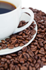 Cup of coffee and coffee beans
