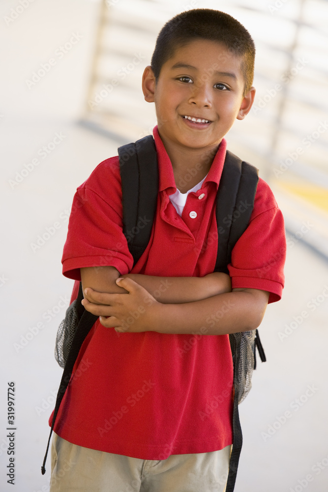 Poster portrait of kindergarten boy with backpack