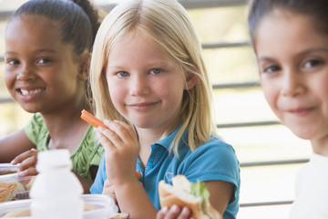 Kindergarten children eating lunch