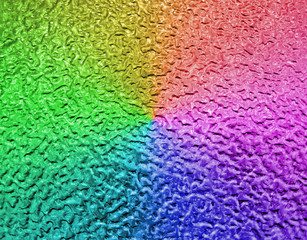 abstract rainbow metallic surface, closeup metal background