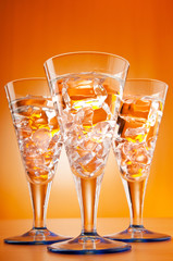 Water in the glass against gradient background