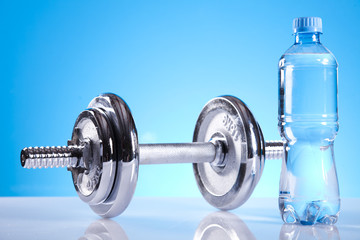 dumbell and mineral water