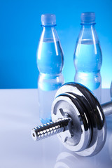 dumbell and mineral water