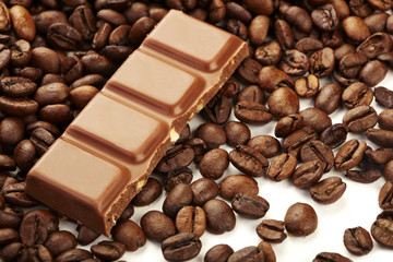 Chocolate bar on coffee beans