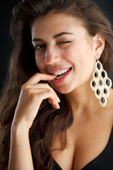 Fototapeta premium Portrait of woman over dark