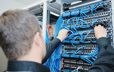young it engeneer in datacenter server room
