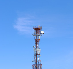 communication tower against the blue sky