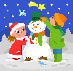 Bambini che decorano un pupazzo di neve a Natale.