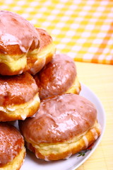 Delicious dessert made of several glazed donuts