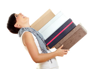 Pretty woman has fun to carry a lot of shoes