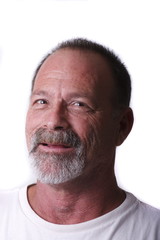 Old Guy with Grey Beard and Mustache Smiling at Camera