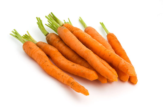 Pile of carrots over white
