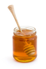 Honey dripper in a jar of honey
