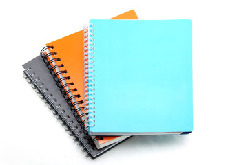 stack of ring binder book