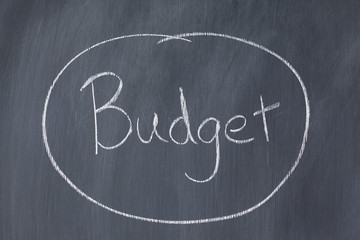 Word "budget" circled on a blackboard
