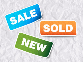 Three wrinkled sale tags