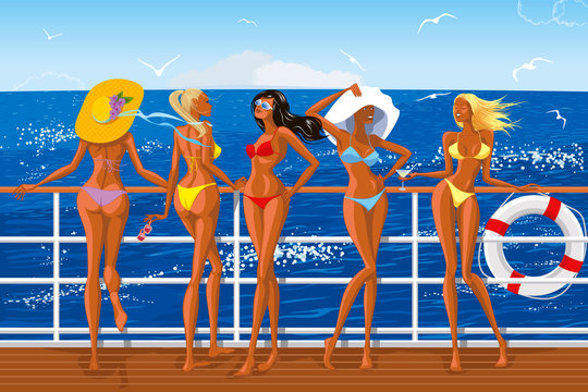 Beautiful girls in bikini sailing on the yacht