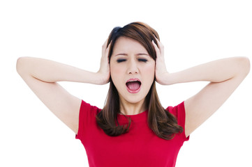 Frustrated young woman covering her ears with hands