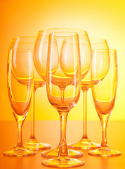 Wine glasses against gradient background