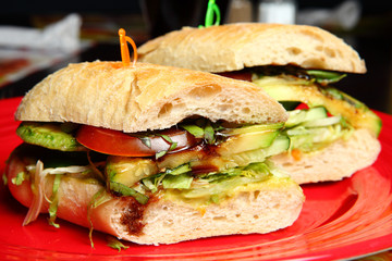 Vegetarian sandwiches on a red plate