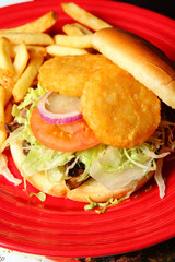 Sandwich with fried potatoes on the plate