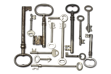 Old keys isolated on white background