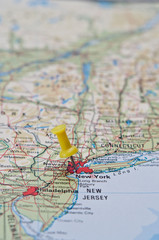 Fototapeta na wymiar Push pin pointing at New York, United States on a map