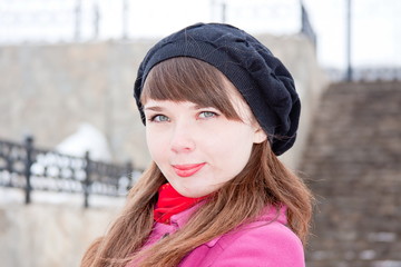 woman is in winter in a park